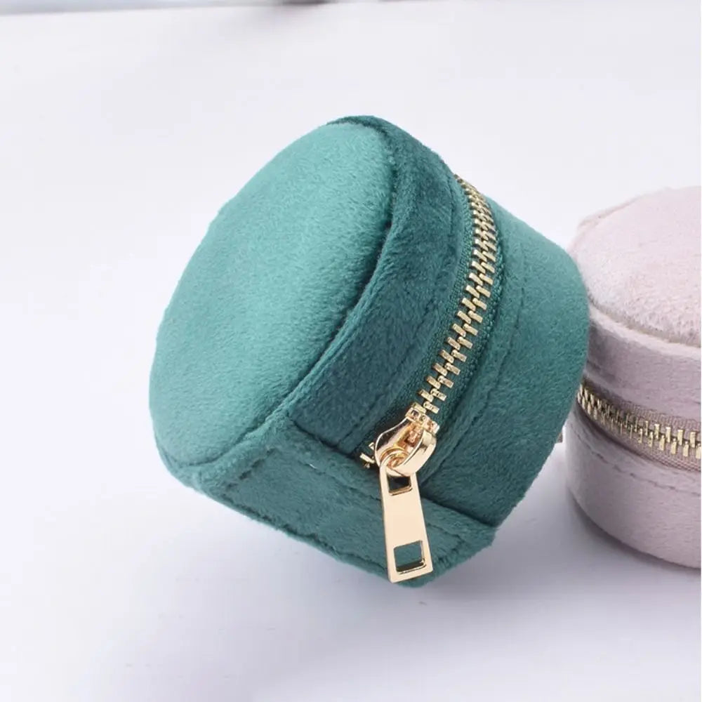 Boîte à bijoux ronde de poche en velours