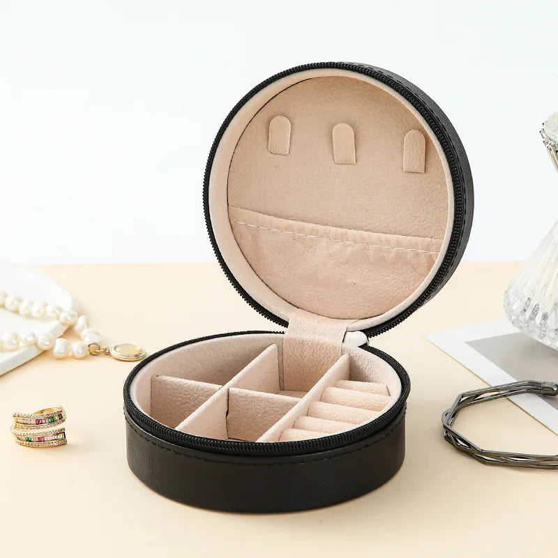 Boîte à bijoux de poche en cuir rigide